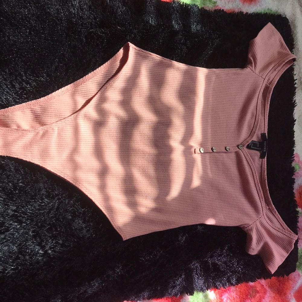 Pink body suit